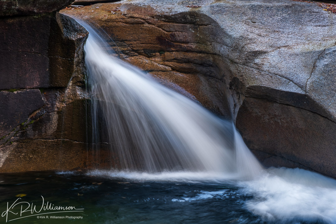 The Basin waterfall in Franconia Notch New Hampshire.