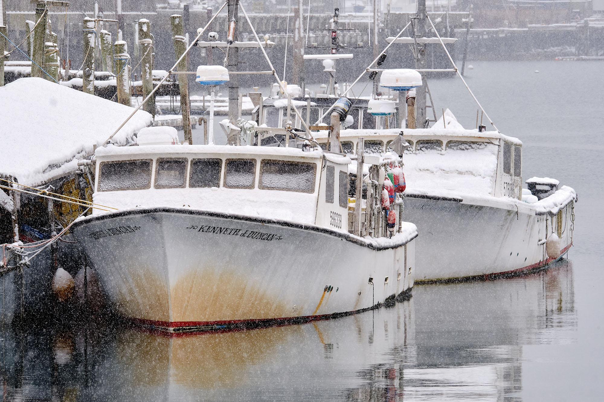 Lobster boats in the snow